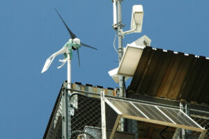 Southwest windpower air micro turbine tied off on the railing of a fire watch tower on bald mountain in the sequoia national forest, 2006.