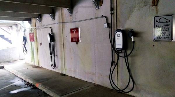 Tesla destination chargers (two tesla wall chargers and one clippercreek) at the spring mill inn, a part of spring mill state park in southern indiana.